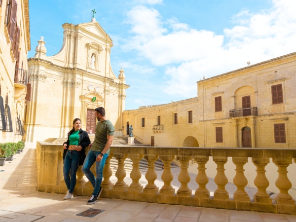 Couple Outside a Church in Gozo