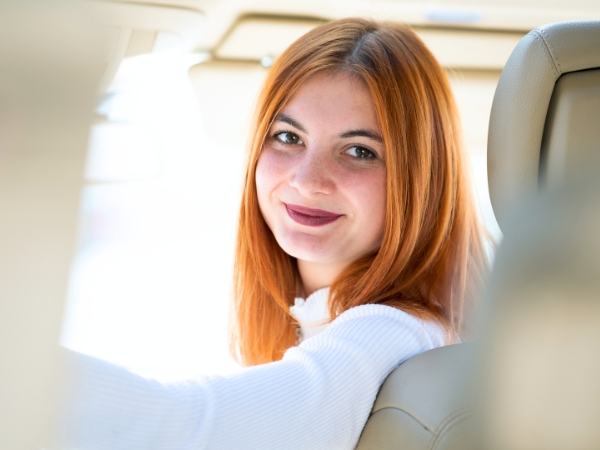 Woman Driving a Car