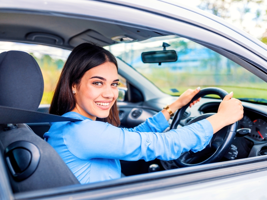 Woman with a Rental Car